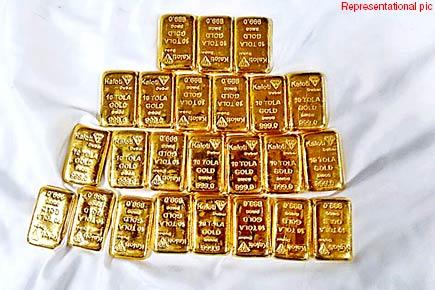 Airport staffer held for transporting gold bars from toilets