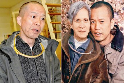 Bizarre! Chinese artist sports his own rib as a necklace