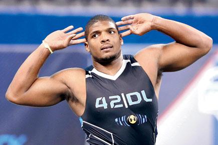 Michael Sam breaks down in tears after getting NFL spot as first openly gay player