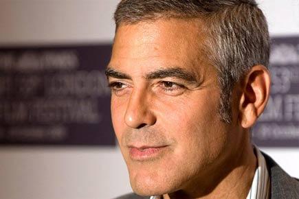 Here's how George Clooney wooed fiance Amal Alamuddin