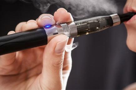 E-cigarettes 'expose people to more than harmless vapor'