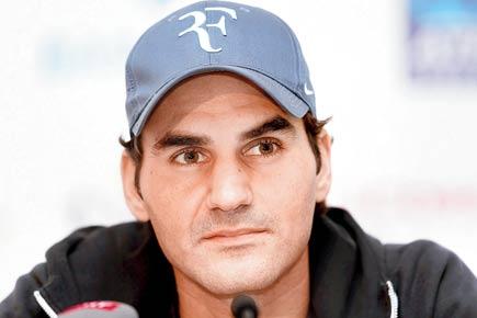 Rome Masters: New dad Roger Federer blown off court by Chardy 