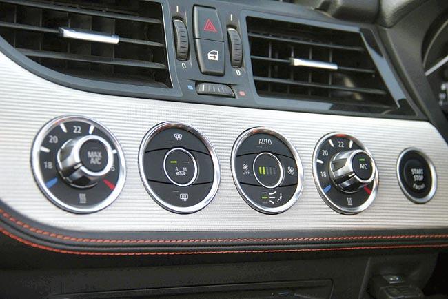 The design and layout of the automatic dual zone A/C controls is a fresh departure from the familiar BMW dashboard layout