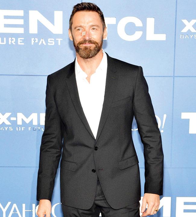 Hugh Jackman, seen here sporting a bandage on his nose, had a surgery to remove a cancerous growth before his film’s Singapore premiere. Pic/AFP