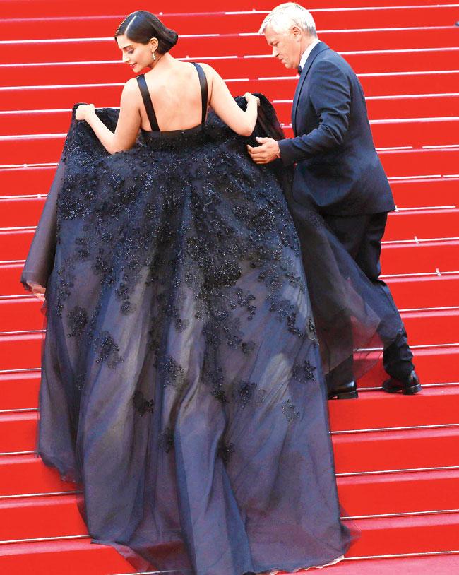 Actress Sonam Kapoor looked like a dream in a vintage black gown at the Cannes red carpet but the voluminous number ensured that she watched every step 