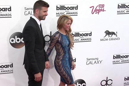 Shakira and Gerard Pique hold hands at Billboard Music Awards 2014  