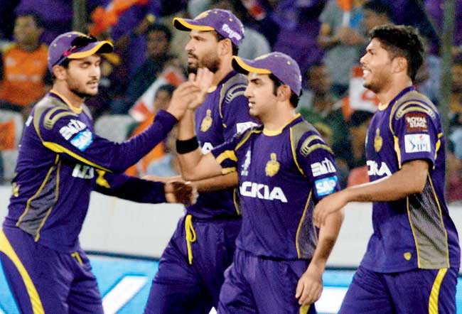 KKR skipper Gautam Gambhir (second from right) celebrates the wicket of Shikhar Dhawan with teammates during their match against Sunrisers Hyderabad on Sunday. Pic/PTI