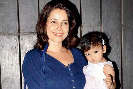 Neelam makes her first public appearance with daughter