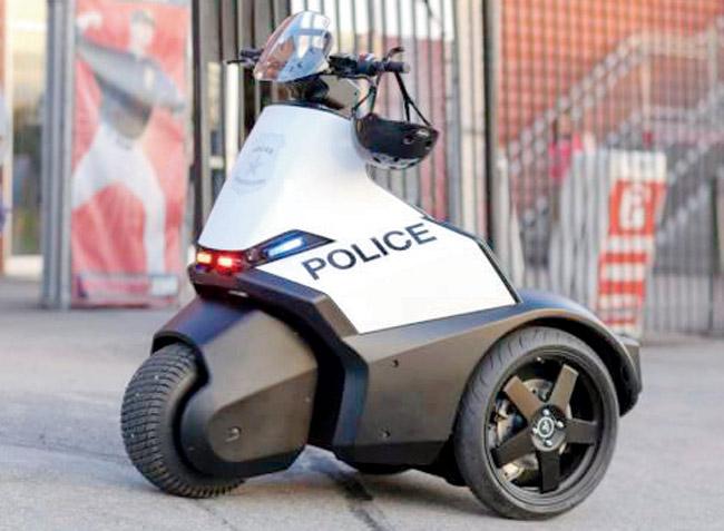 multi-purpose: The tricycle is designed to be used in urban areas where a regular patrol car is too big for the job. Pic/Segway