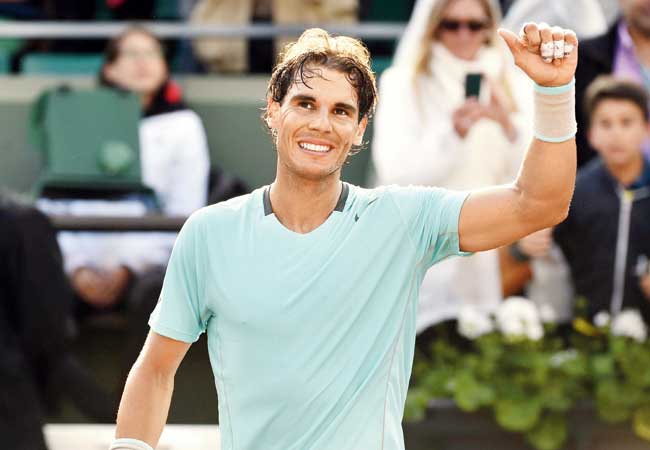 Rafael Nadal celebrates after beating Robby Ginepri. Pics/AFP