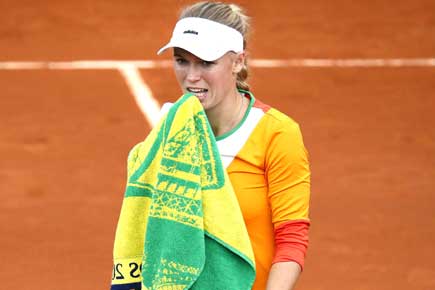 French Open: Wozniacki beaten on court after losing in love