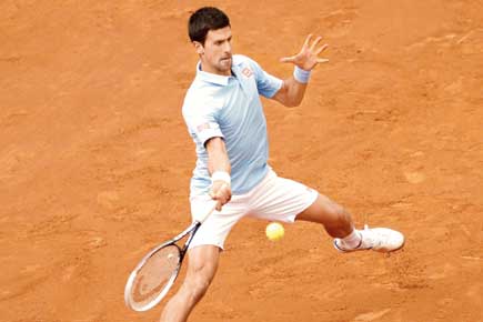 French Open: Novak Djokovic sails past Jeremy Chardy into Rd 3