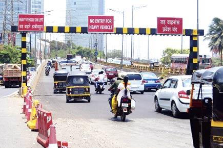 Dindoshi flyover opens, but traffic jams to continue