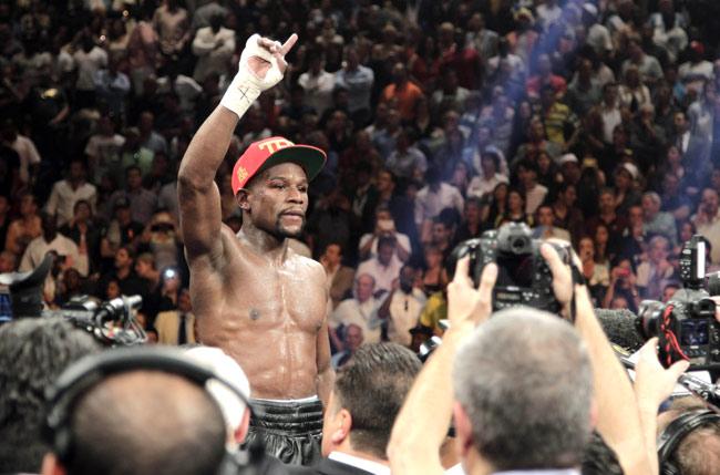 Floyd Mayweather Jr. of US celebrates his win over Marcos Maidana of Argentina. Pic/AFP