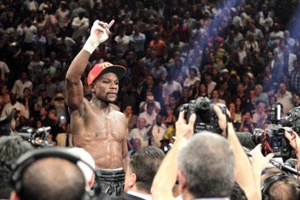 Boxing: Floyd Mayweather wins WBA title at Vegas