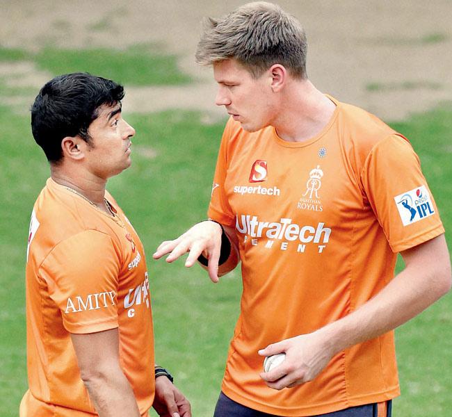 James Faulkner (right) and Pravin Tambe of Rajasthan Royals during a practice session in Delhi. Pic/PTI