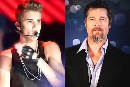 Brad Pitt buys son a portrait of Justin Bieber?