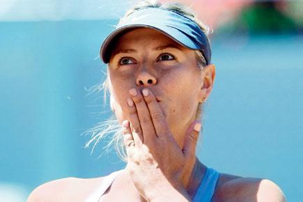 Li Na, Maria Sharapova advance in Madrid