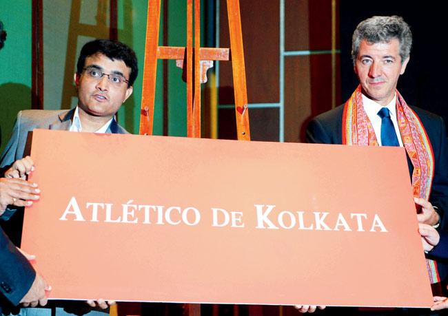 Sourav Ganguly with the owner & CEO of Atletico Madrid, Miguel Angel Marin unveils the name of the Kolkata franchise of the Indian Super League (ISL) in Kolkata yesterday. Pic/AFP