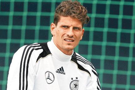 Germany unveil World Cup squad, axe Mario Gomez