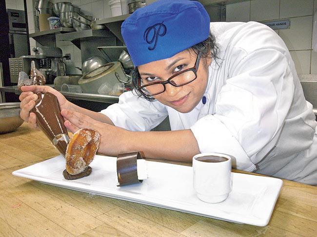 Aditi Keni prepares coffee and doughnuts