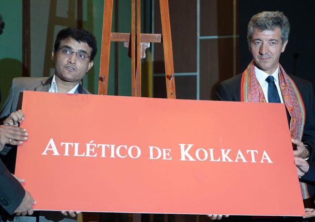 Former Indian cricket captain Sourav Ganguly (L) and owner and CEO of football club Atletico Madrid, Miguel Angel Marin unveil the name plate during a press conference to announce the name of Kolkata franchise "Atletico De Kolkata" of the Indian Super League (ISL) inKolkata on Wednesday.