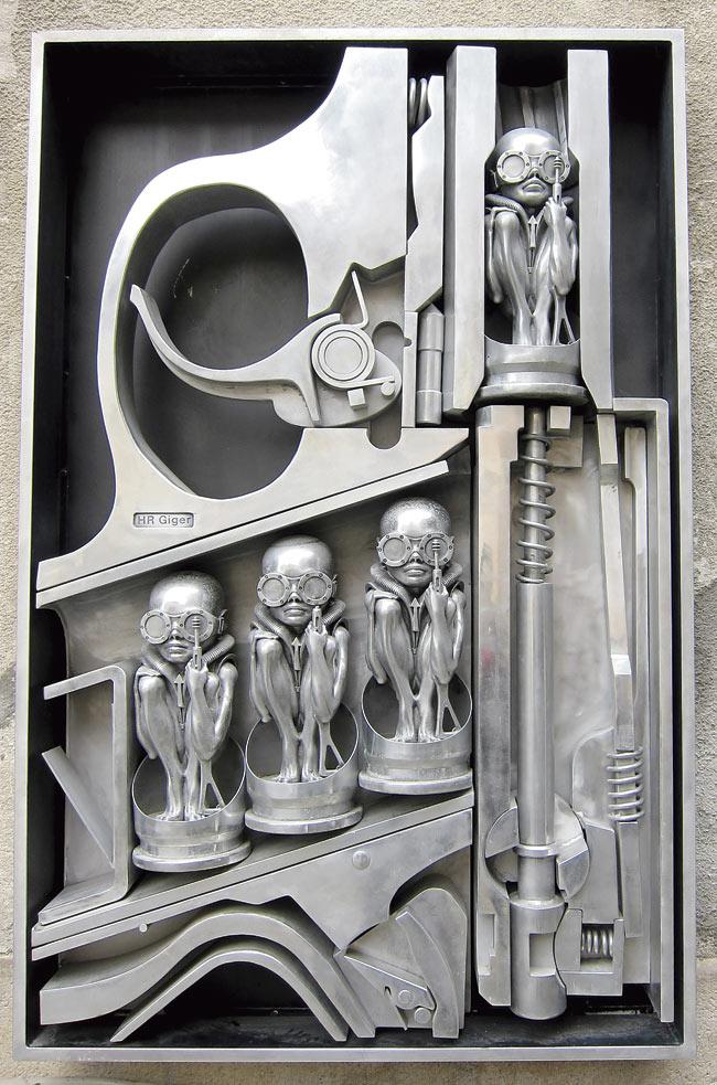 Intricate artwork went into designing the alien (top). (Below) Birth Machine, another well-known creation by Giger