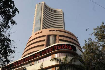Sensex back in deep red; nosedives 327 pts in volatile trade