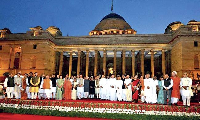 President Pranab Mukherjee, Vice-President Hamid Ansari, PM Narendra Modi and his Council of Ministers after the swearing-in ceremony at Rashtrapati Bhawan yesterday. PicS/Pti