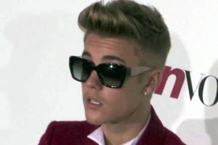 Justin Bieber rob's woman, questioned by cops