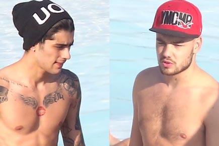 Spotted: Liam Payne, Zayn Malik strip 