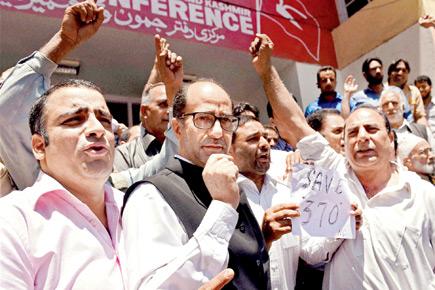 RSS, Omar Abdullah duel over Article 370