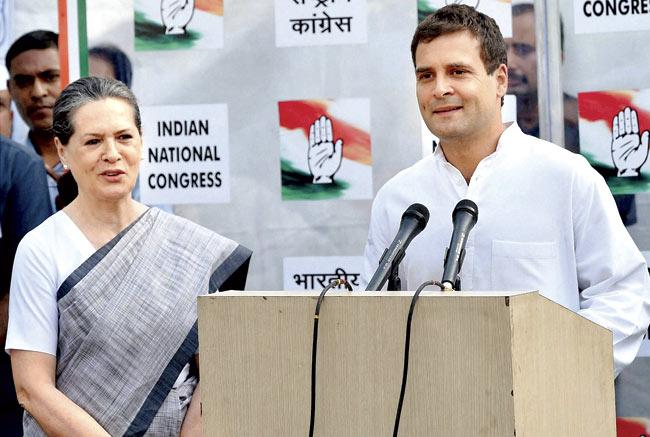 Sonia and Rahul Gandhi accepted complete responsibility for the defeat, in New Delhi on Friday. Pic/PTI