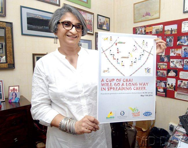 Viji Venkatesh displays the poster of Chai for Cancer at her office in Worli. Pic/Sameer Markande