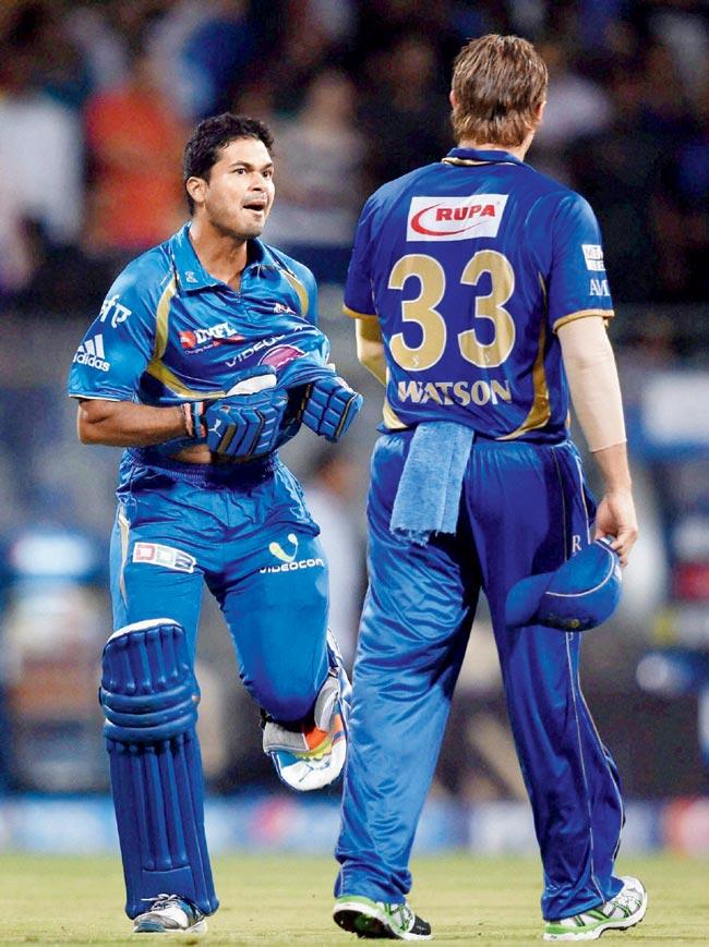 Aditya Tare and Shane Watson after MI