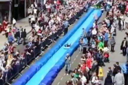 Watch this giant water slide in the middle of Bristol street