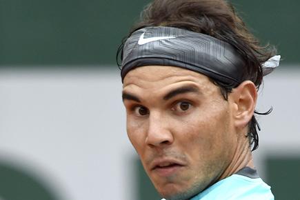 Bus driver from Madrid has exact face and hairdo as Rafael Nadal!