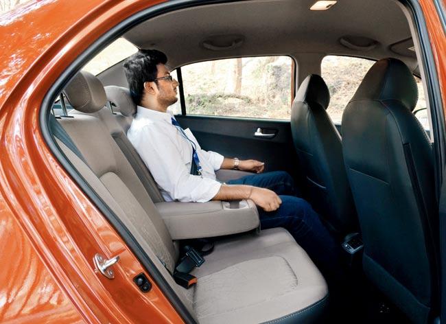 Back seats are comfortable, with the backrests more angled backwards than on the hatchback version. Central armrest and rear A/C vents add to the comfort