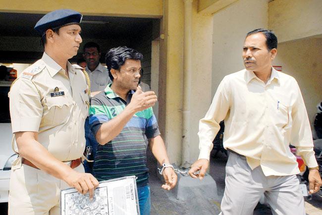 In the net: Sagar Gaikwad (centre), who confessed to killing his family, has been remanded to police custody till April 15