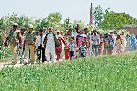Elections 2014: Riot victims cast vote amidst security in UP