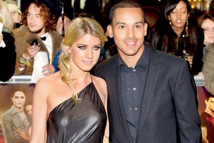 Arsenal striker Theo Walcott welcomes first child with wife Melanie Slade