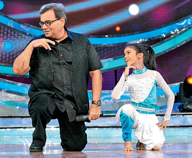 Subhash Ghai with a participant on the sets of Dance India Dance