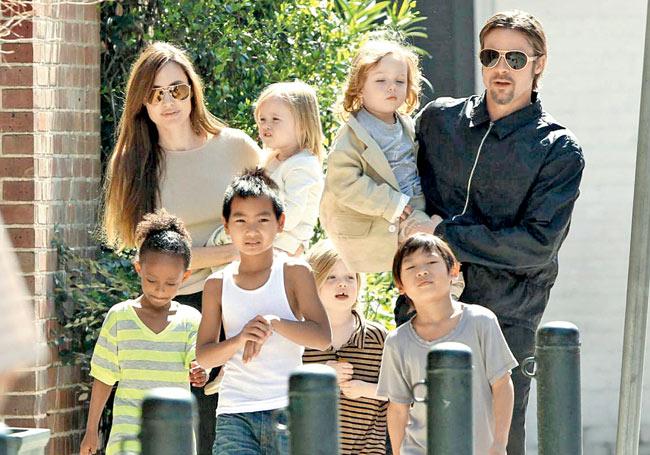 From left: Zahara, Angelina Jolie, Maddox, Knox Léon, Shiloh, Vivienne Marcheline, Pax and Brad Pitt. Pic/Getty Images