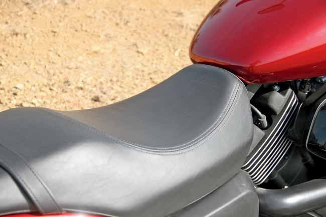 The rider seat is cushy and comfortable. We wish the handlebars were a bit closer to suit even shorter riders. The pillion seat and position of the rear foot-pegs is not  too comfortable