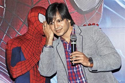 What is Spider-Man whispering to Vivek Oberoi?