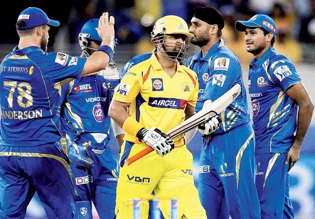 Mumbai Indians celebrate the wicket of Suresh Raina during the match against Chennai Super Kings on Friday. PTI Photo/BCCI