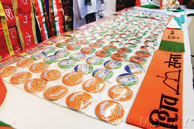 Political merchandise: Badges and flags of different political parties on display at Murudkar Zendewale in Kasba Peth. Pic/Mohan Patil