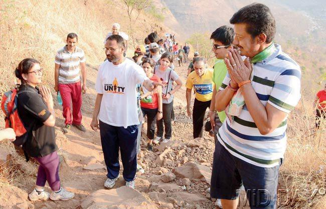 Bonding with them: BJP Lok Sabha candidate Anil Shirole (extreme right) went to Sinhagad Fort on Sunday and interacted with trekkers. Pic/Mohan Patil