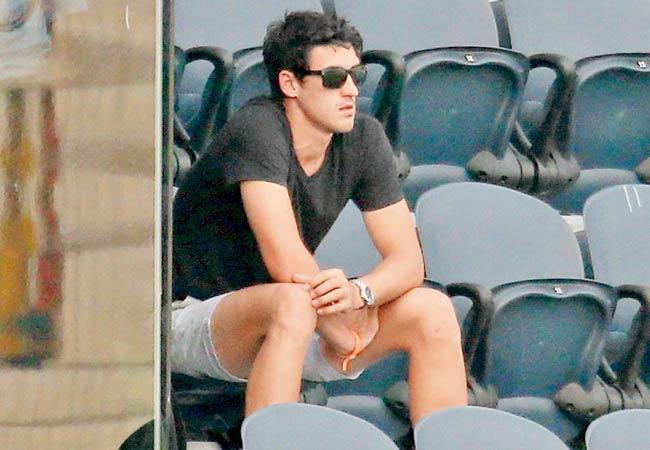 Special spectator: Australia pacer Mitchell Starc looks on from the stands during the ICC Women