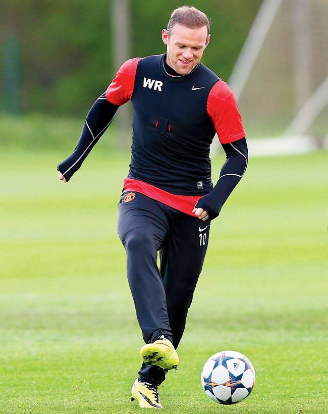 Wayne Rooney trains before leaving for Germany ahead of Man United
